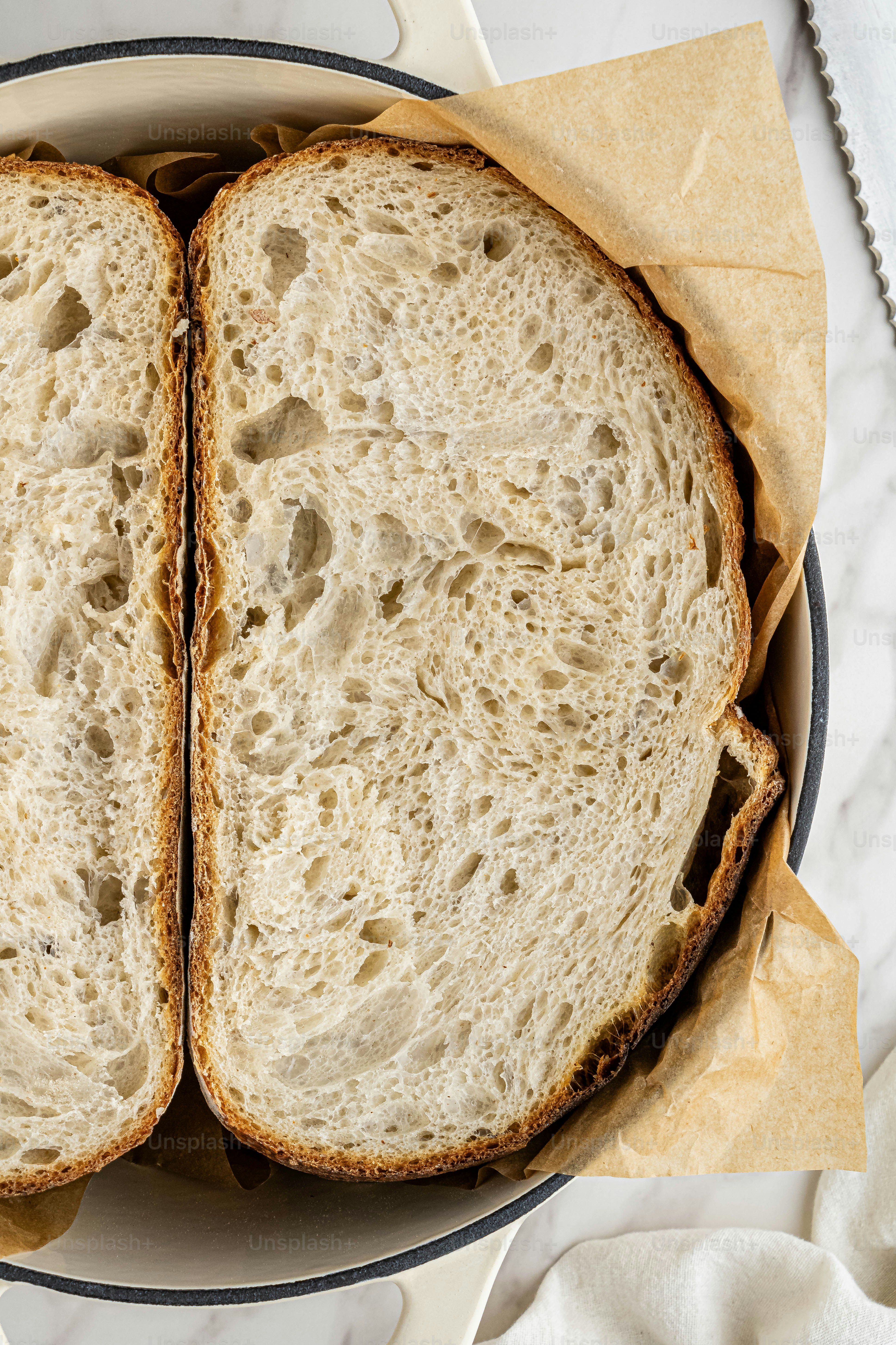 a close up of a sandwich in a bowl on a table