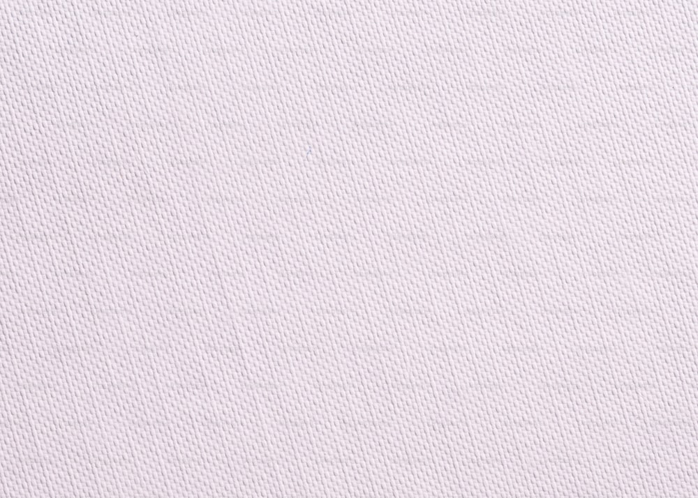 a close up of a white shirting material