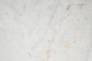 Un primer plano de una superficie de mármol blanco
