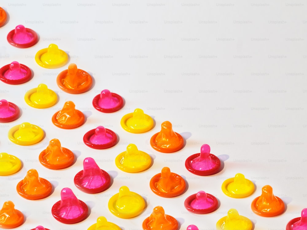 a group of rubber ducks sitting on top of a white table
