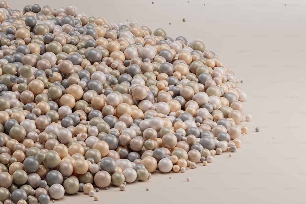 a pile of pearls on a white surface