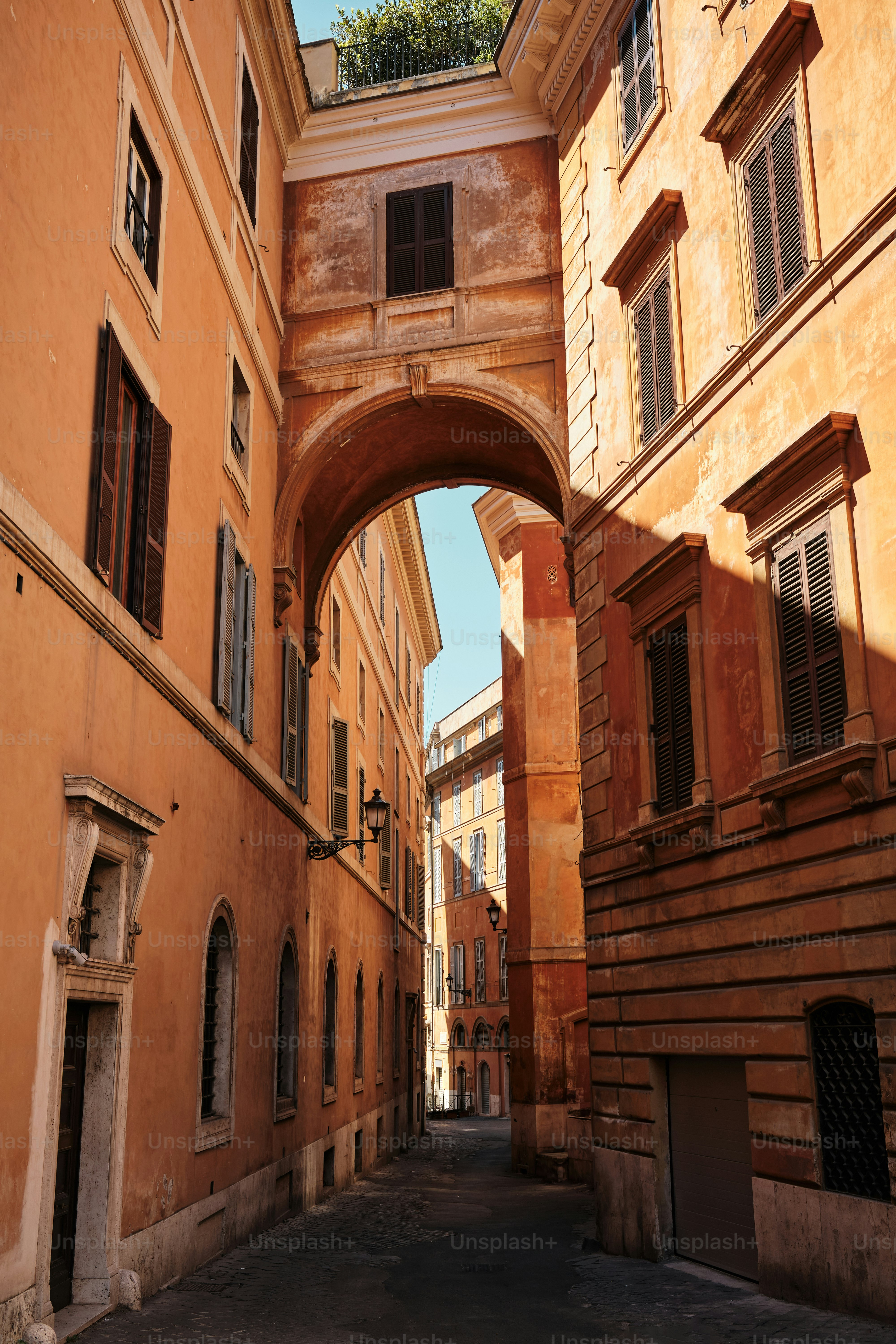 an arch in a building with a clock on it