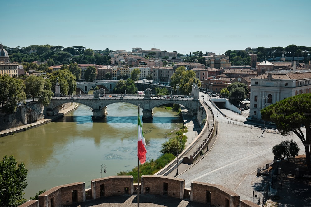 a view of a bridge over a river in a city