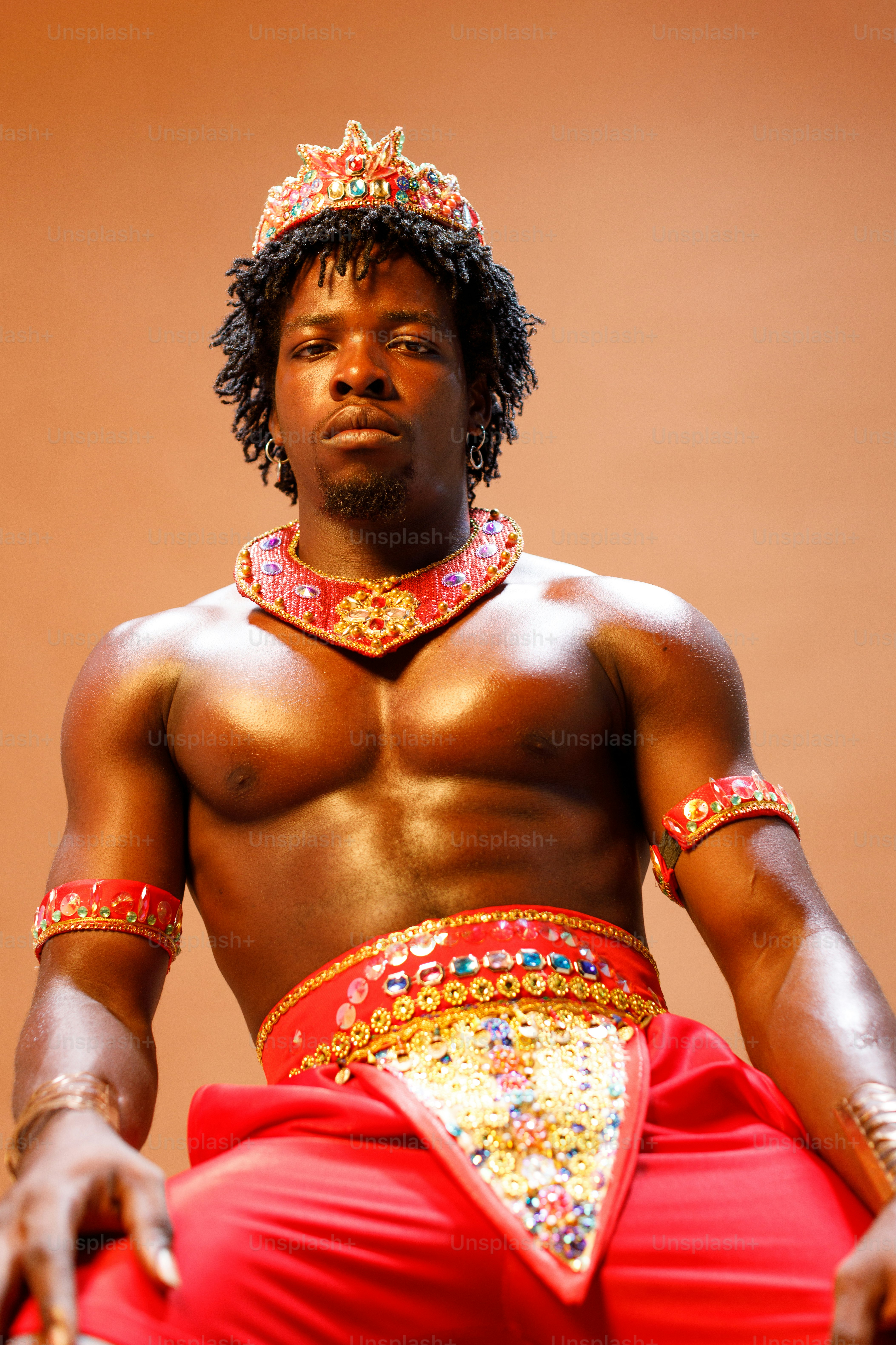 a man with a crown on top of his head