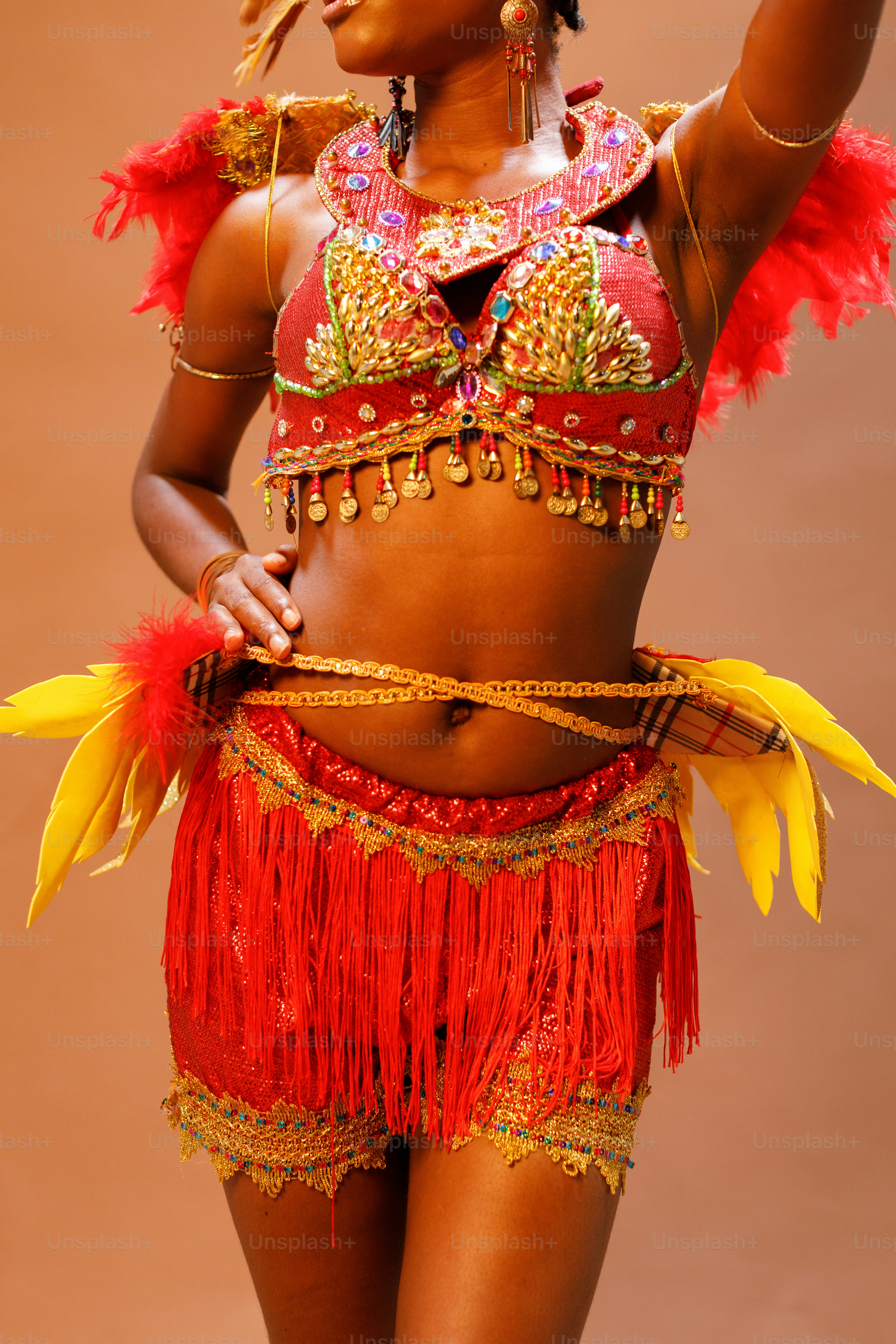 a woman in a red and yellow costume