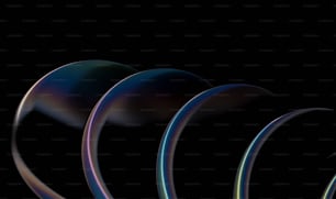 a black background with a series of curved objects