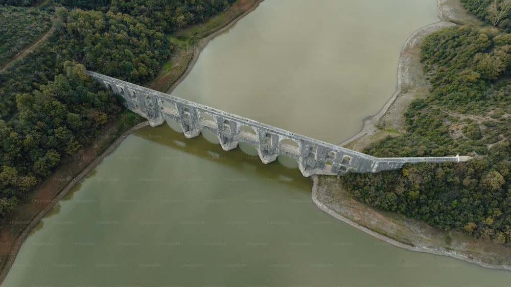 an aerial view of a bridge over a river