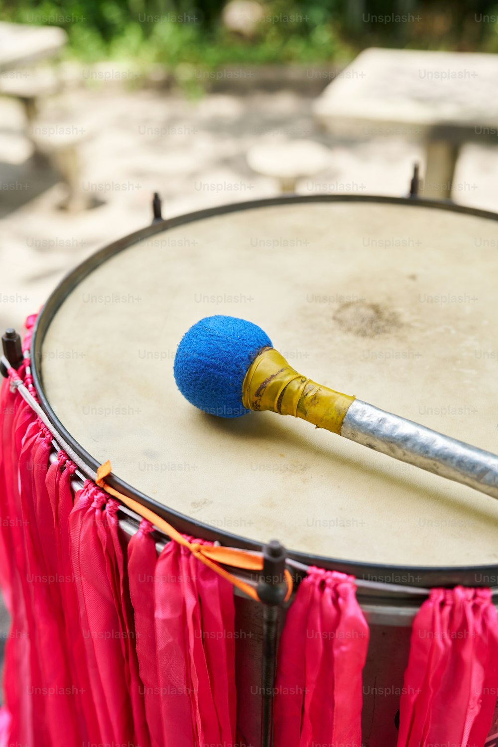 a drum with a brush on top of it