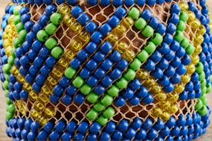 a close up of a bag made out of beads