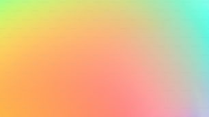 a blurry image of a rainbow colored background