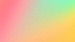 a blurry image of a rainbow colored background