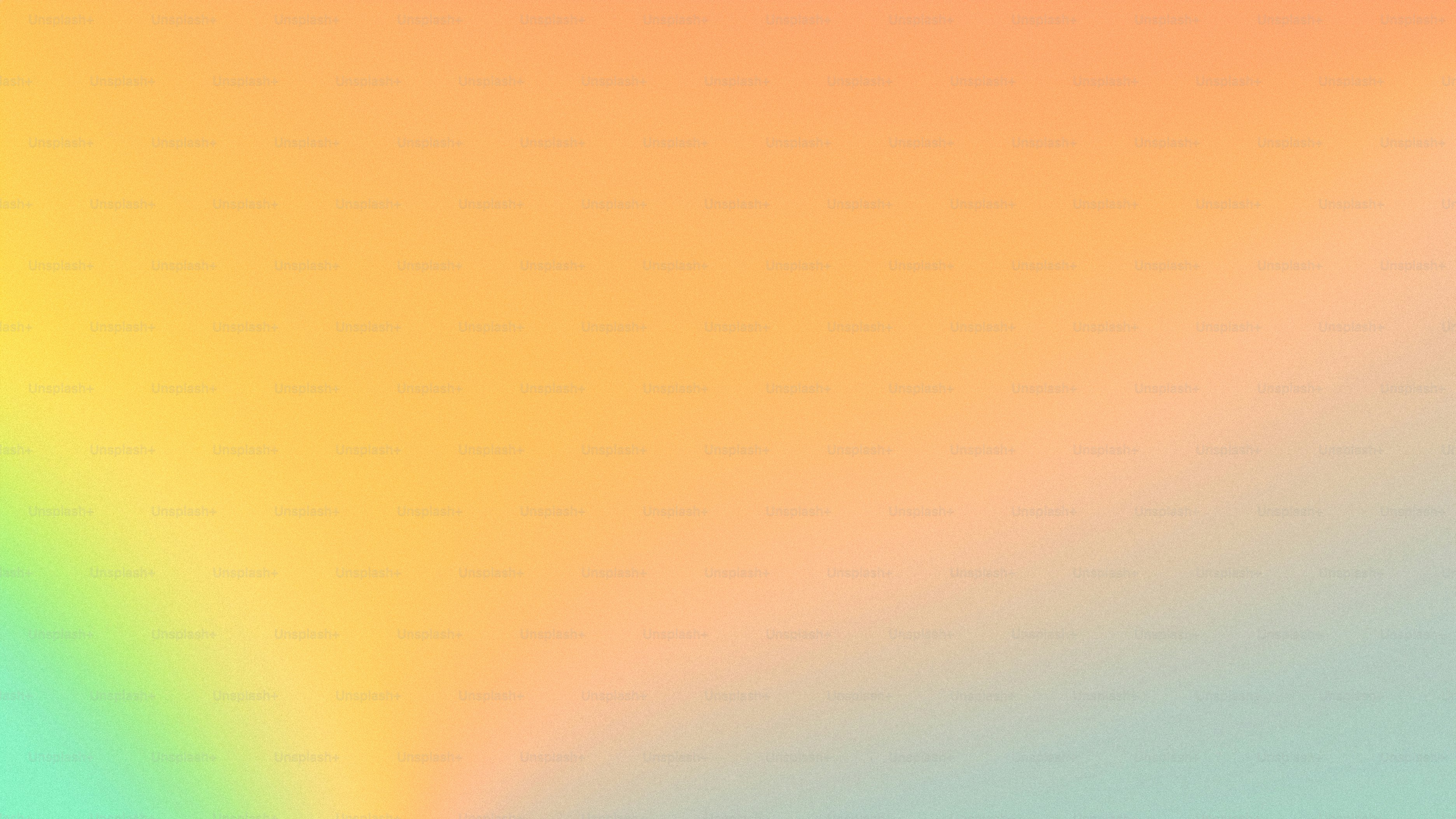 a blurry image of a rainbow colored background