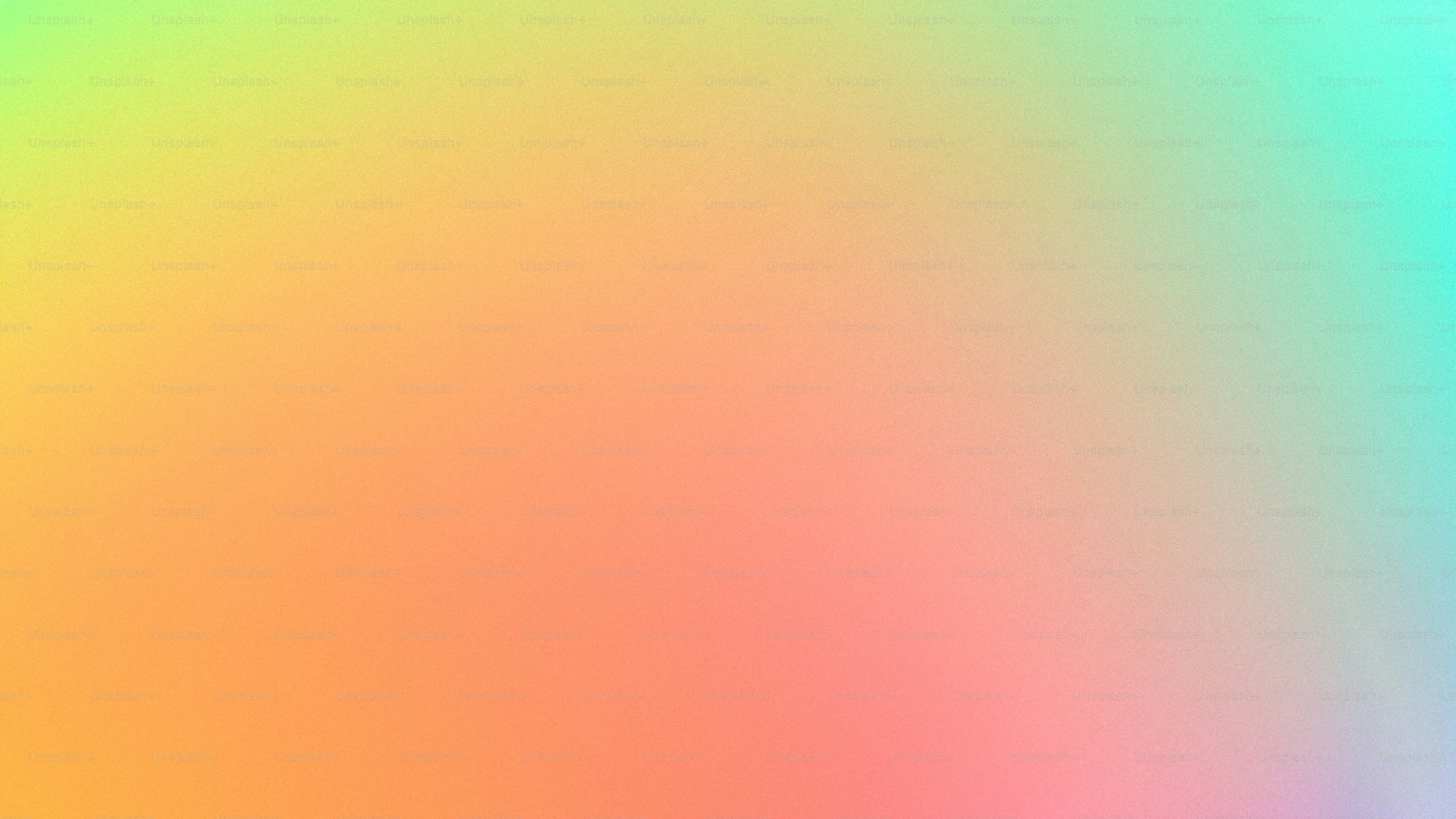 a blurry image of a rainbow colored background