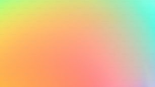 a blurry image of a rainbow colored background