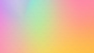 a blurry image of a rainbow colored background