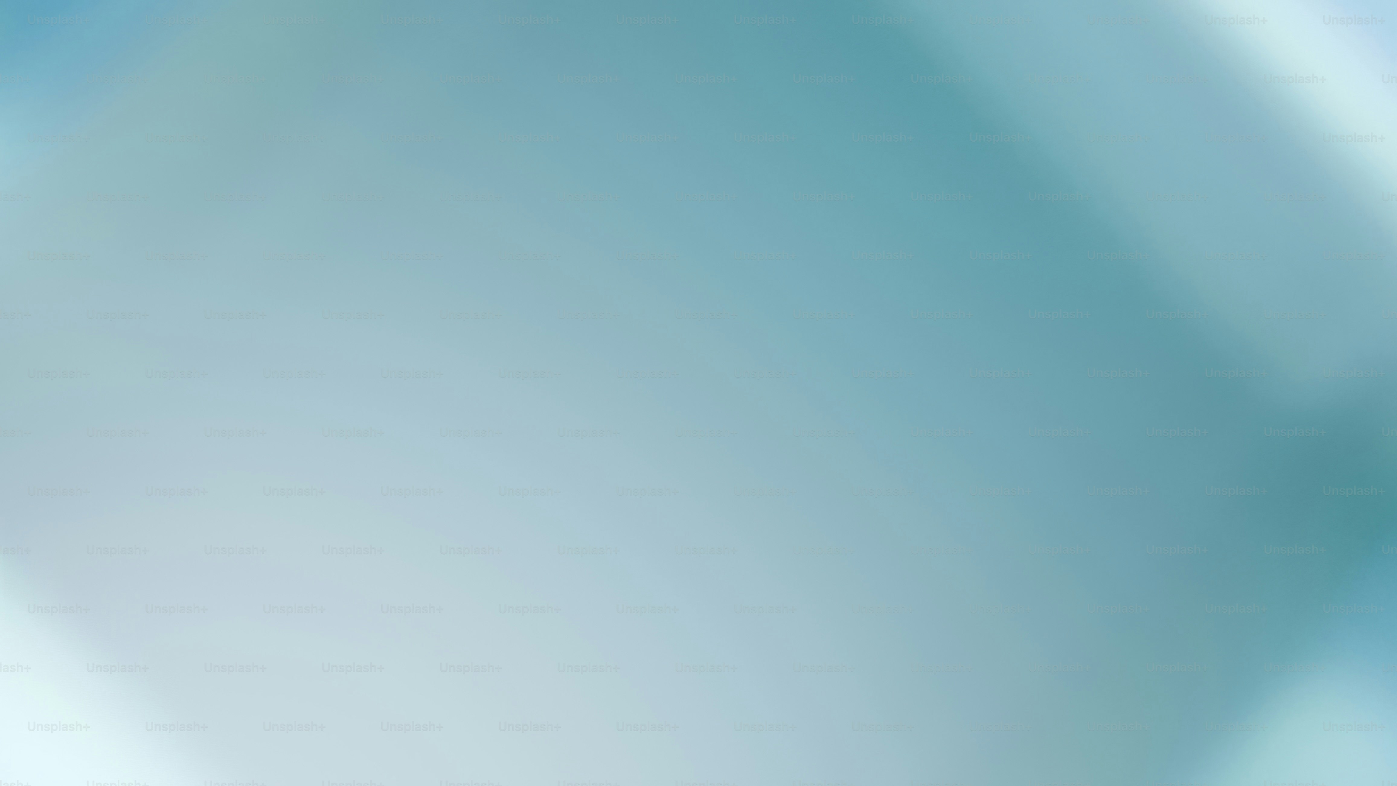 a blurry image of a blue and white background