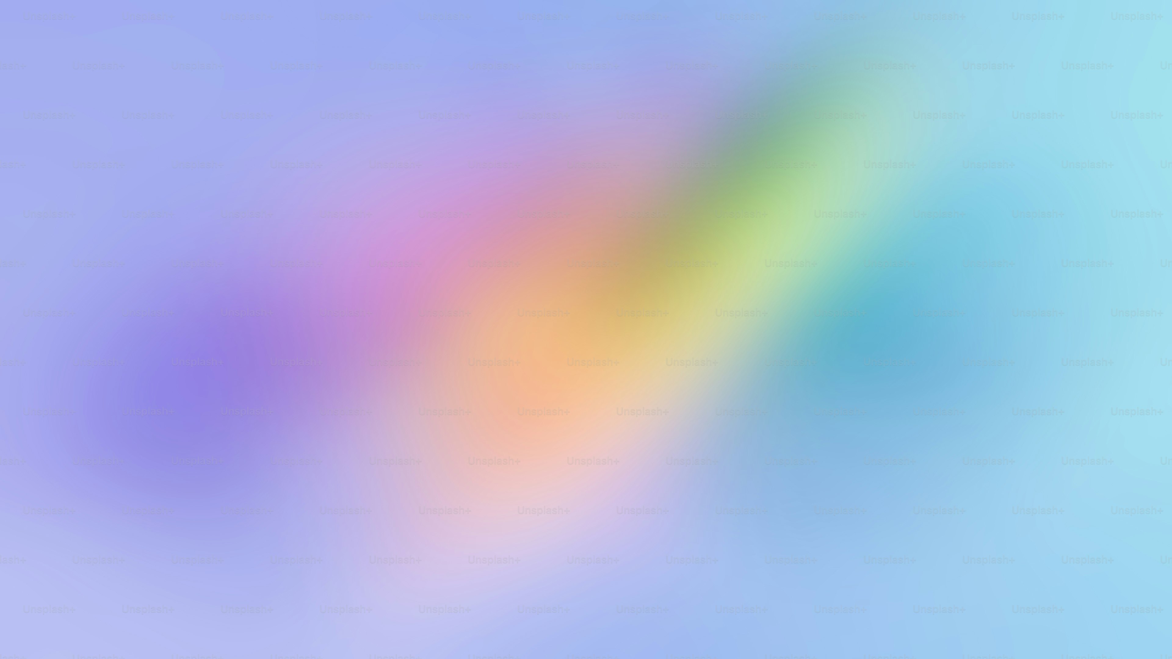 a blurry image of a rainbow in the sky