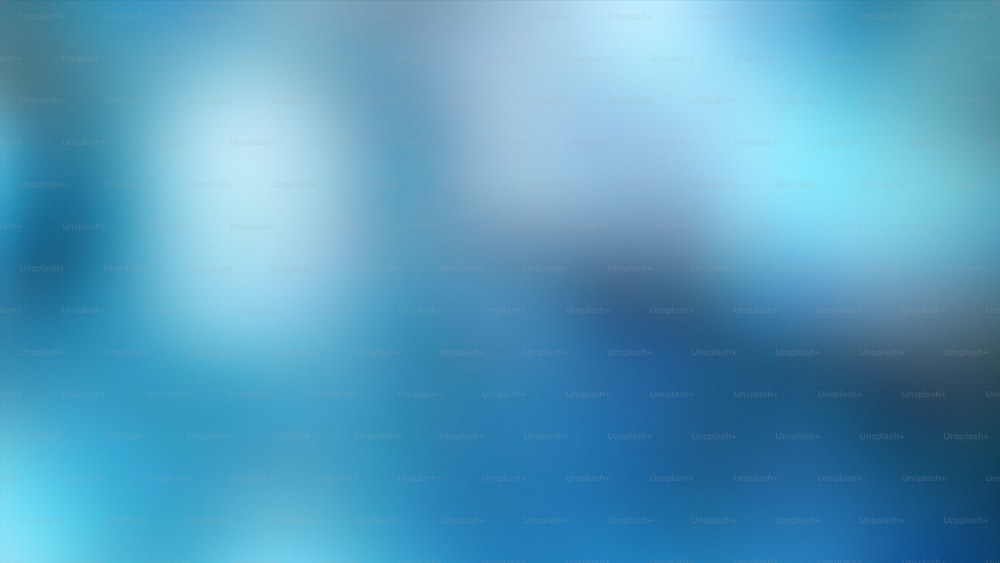 a blurry image of a blue and white background