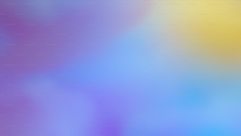 a blurry image of a blue, yellow, and purple background