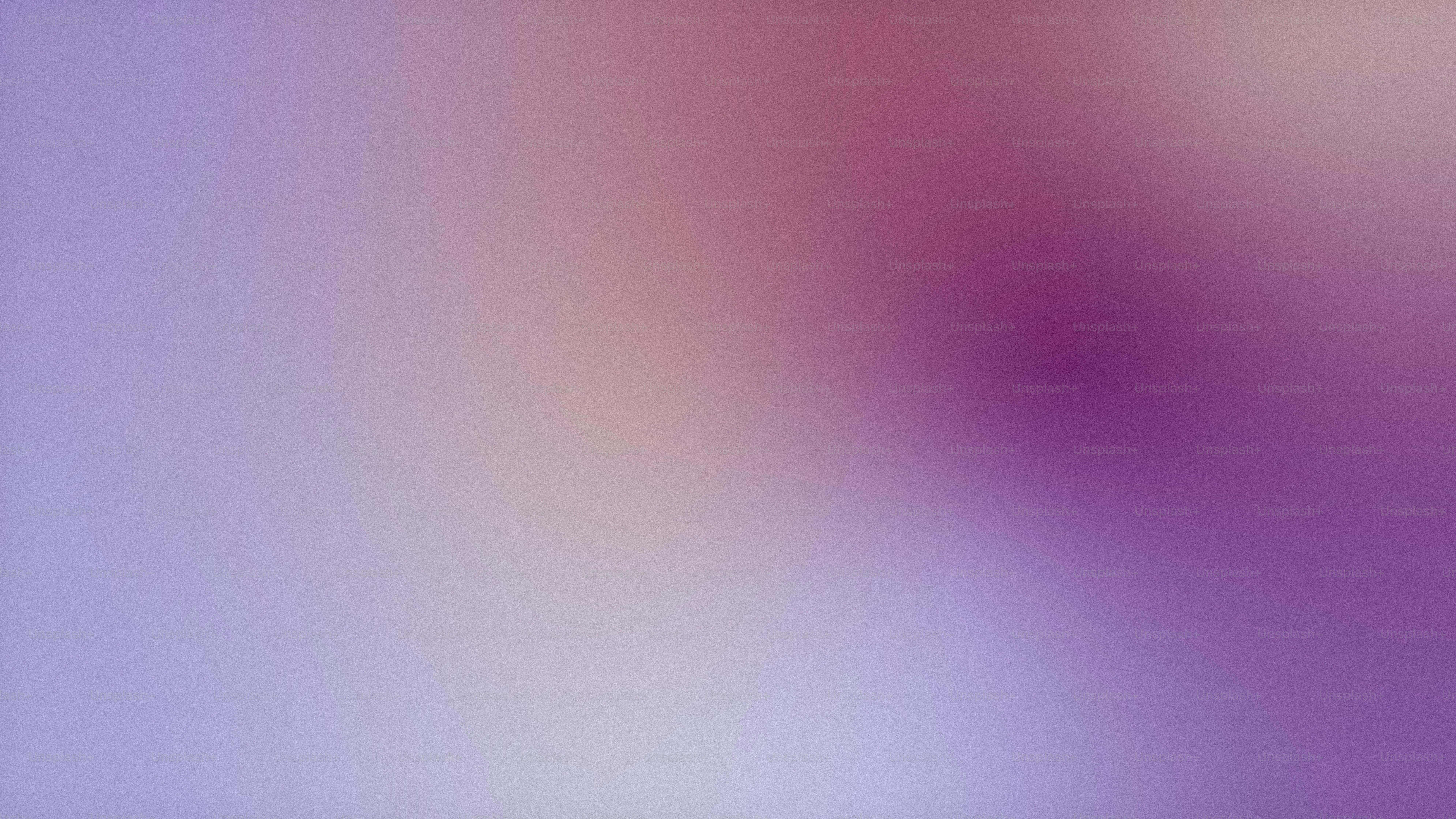 une image floue d’un arrière-plan violet