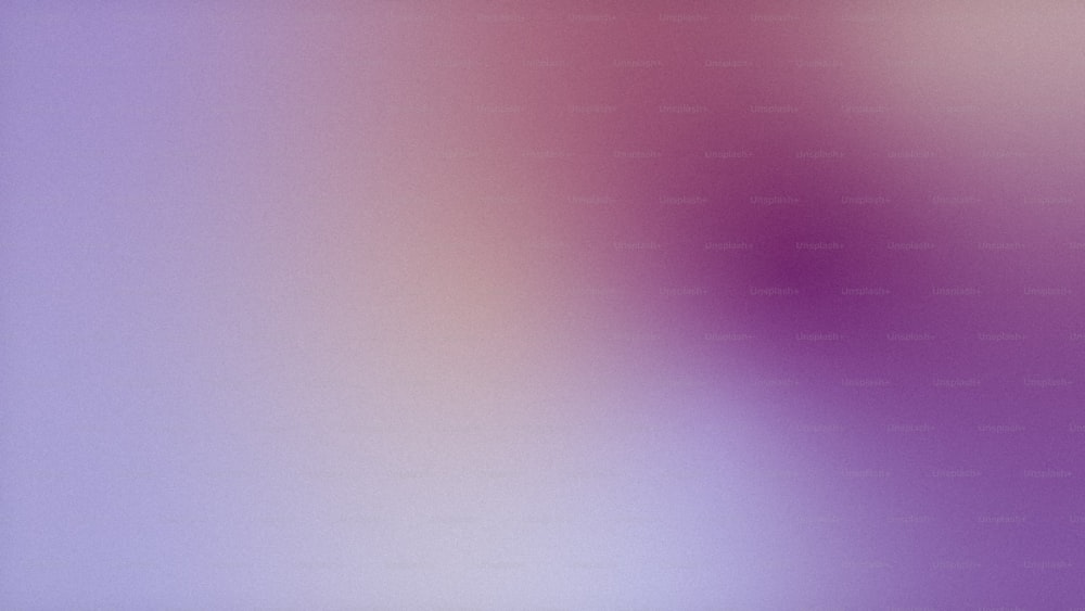 a blurry image of a purple background