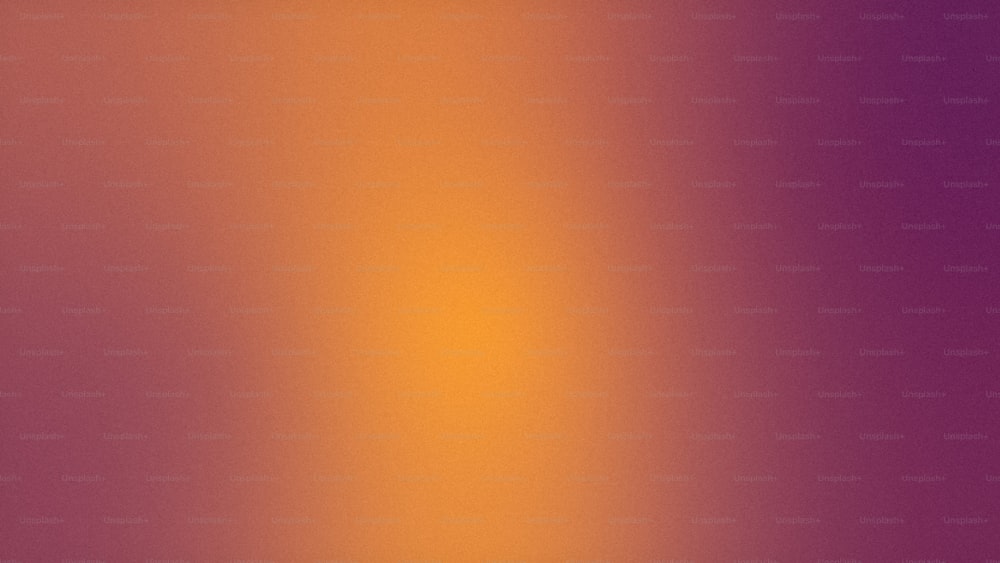 uma imagem desfocada de um fundo roxo e laranja