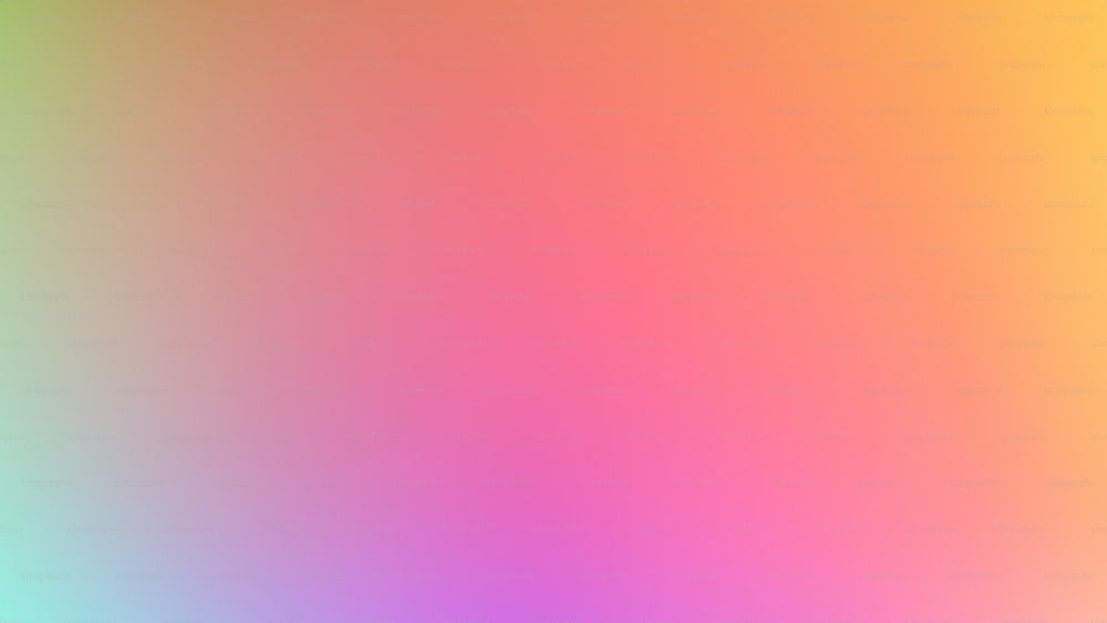 a blurry image of a rainbow colored background