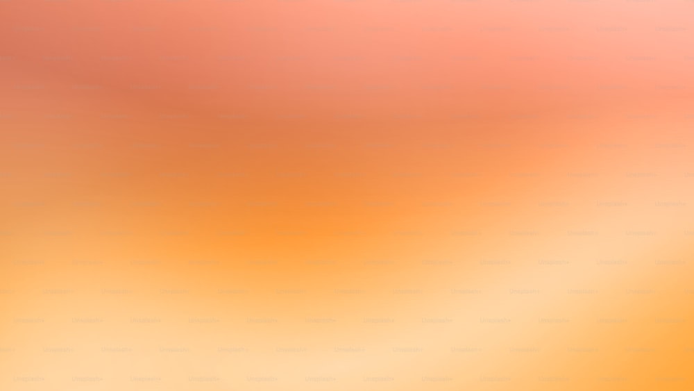 a blurry orange and yellow background with a white border
