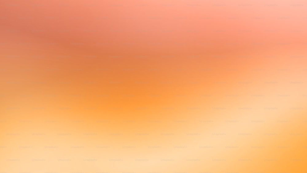 a blurry orange and yellow background with a white border