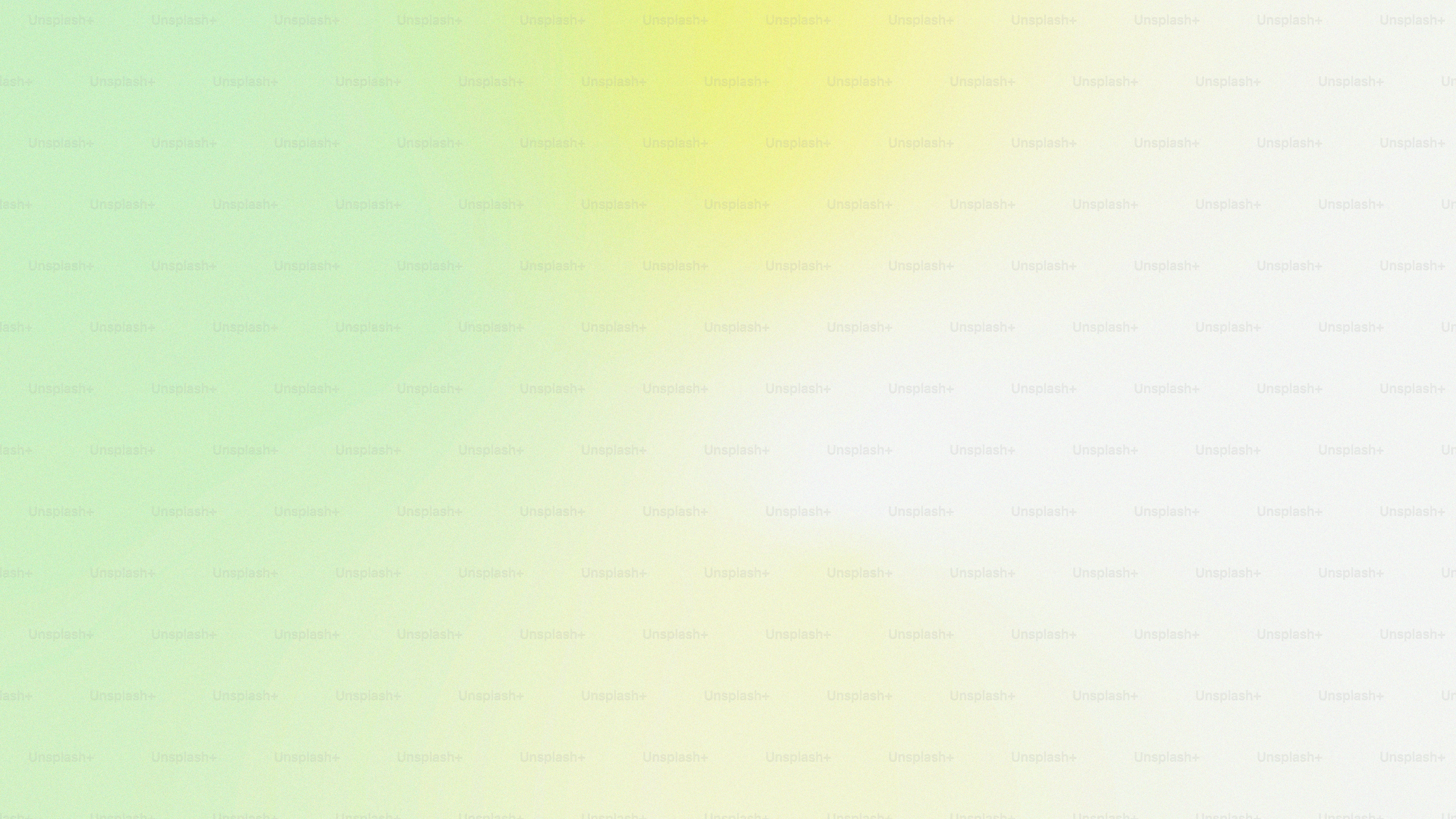 una foto borrosa de un fondo amarillo y verde