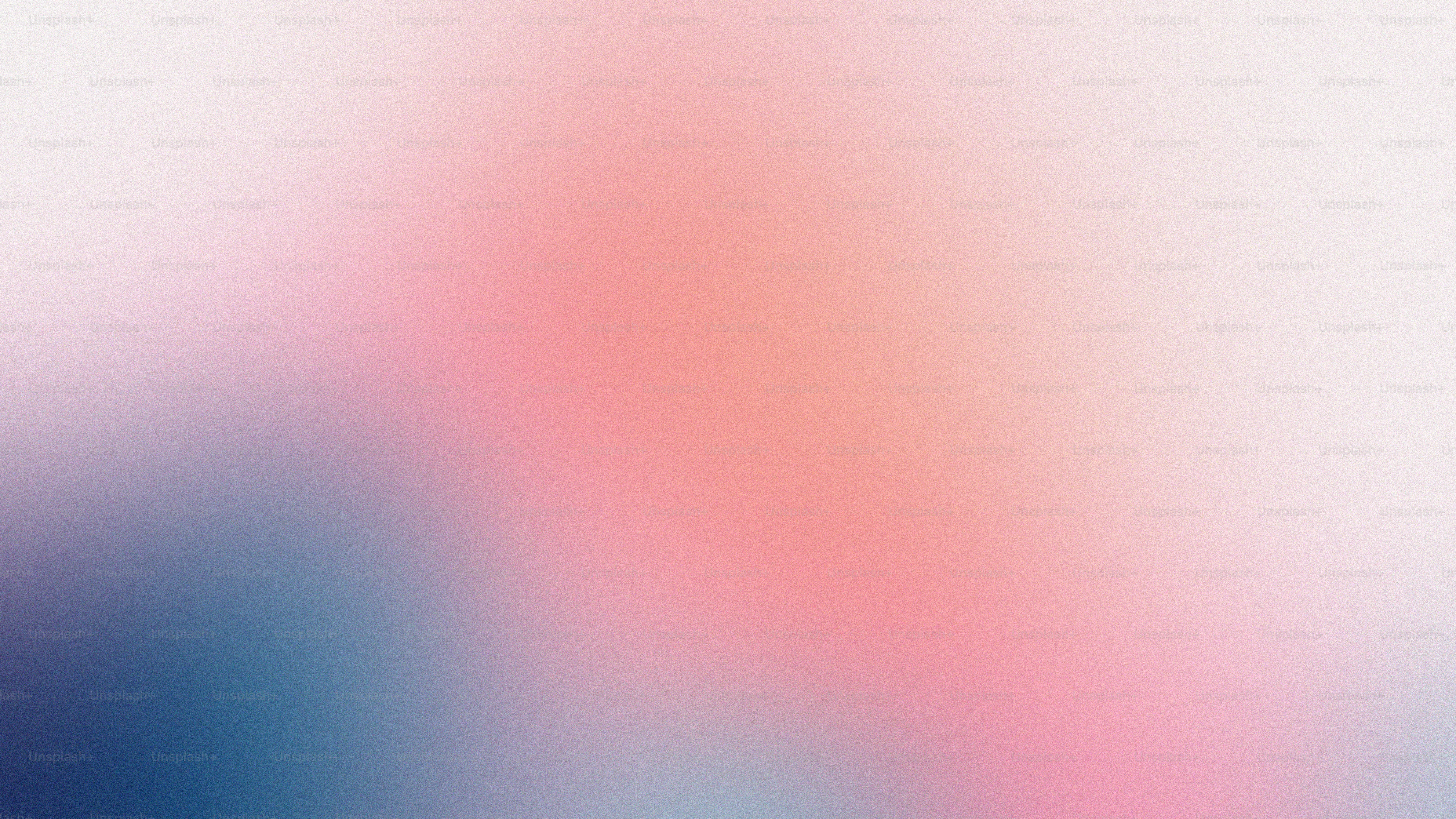 a blurry image of a pink and blue background