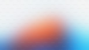 a blurry image of an orange and blue background