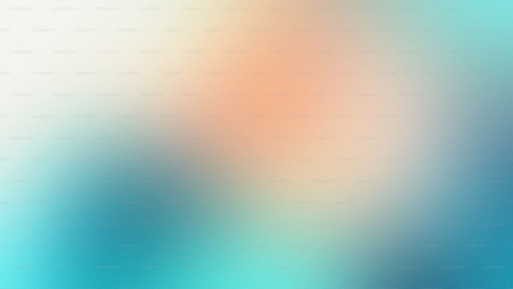 a blurry image of a blue and orange background