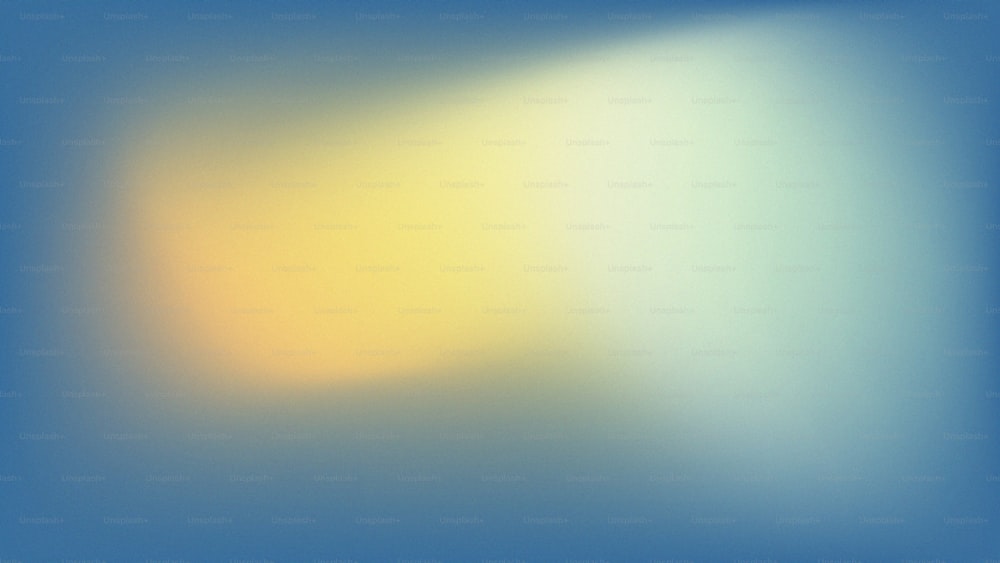 une image floue d’un fond jaune et bleu