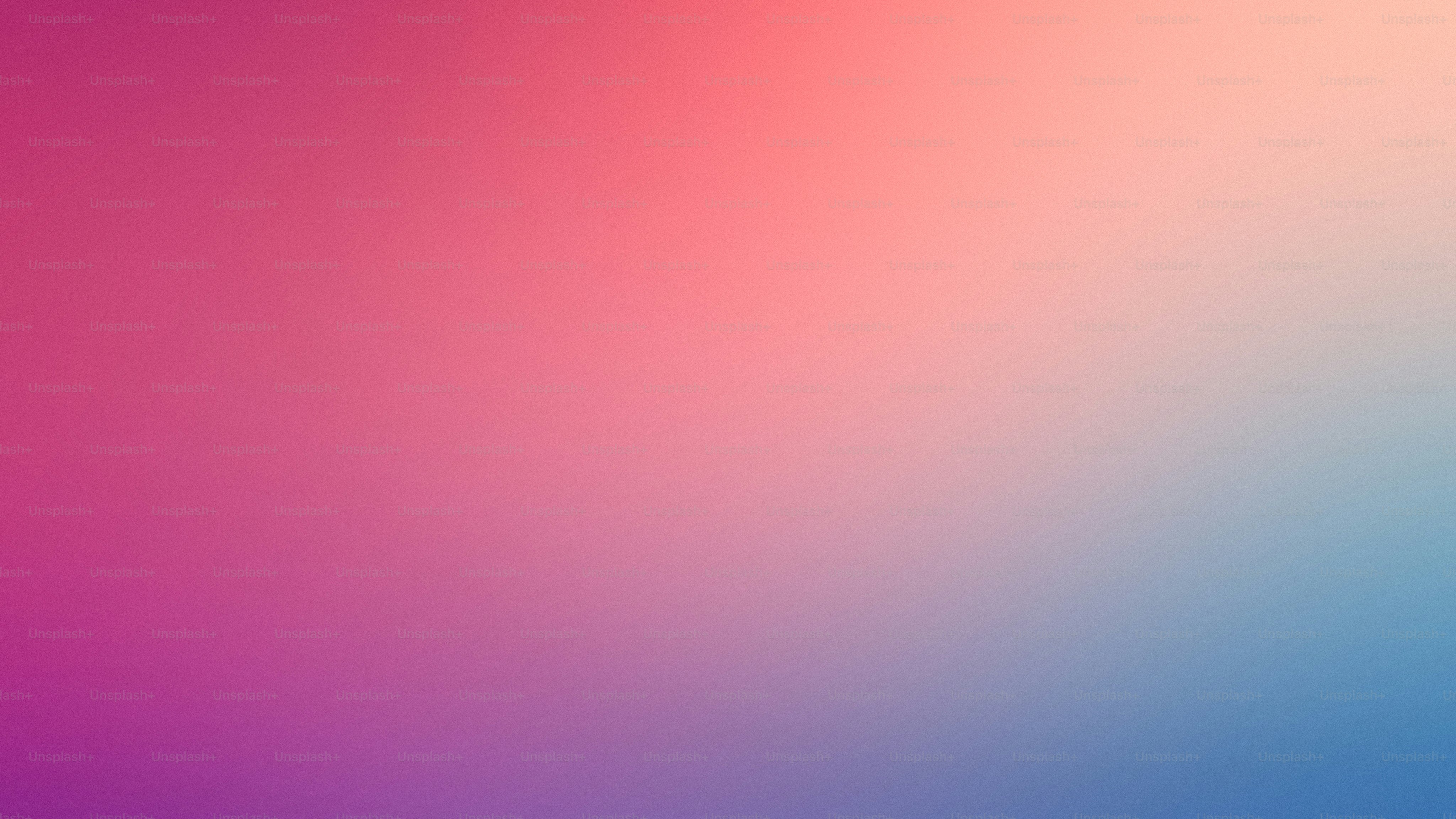 un'immagine sfocata di uno sfondo rosa e blu