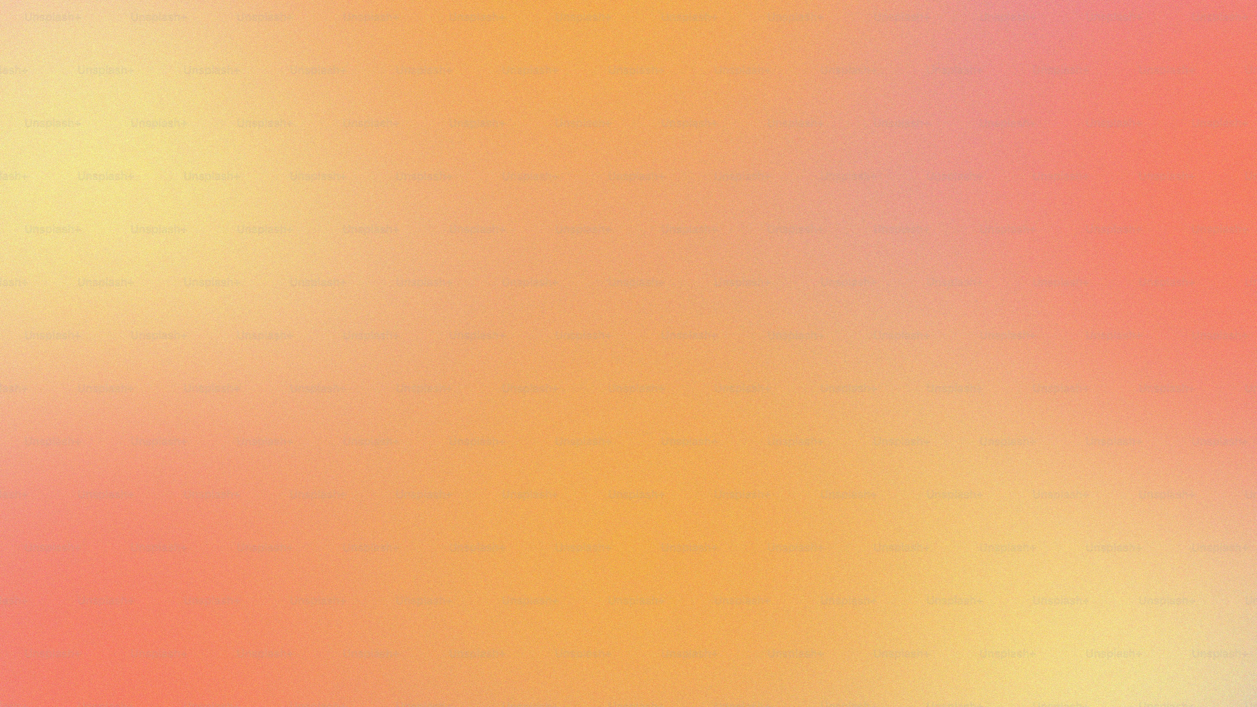 a blurry image of a red and yellow background