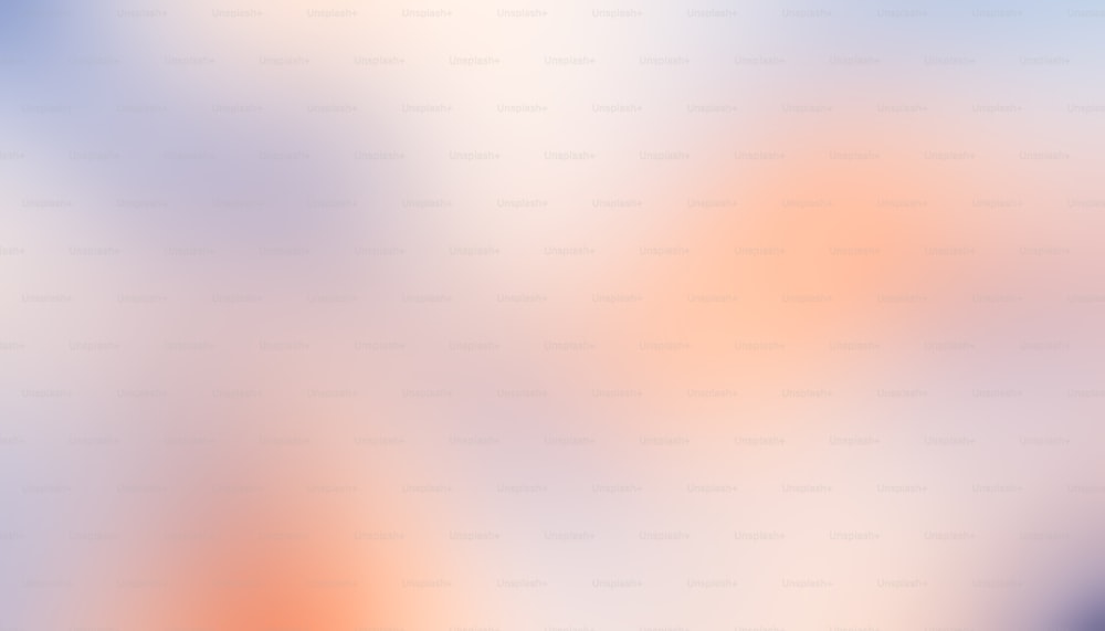 a blurry image of an orange and blue background