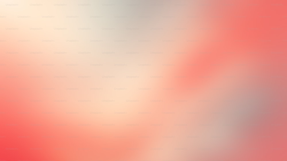 a blurry image of a red and white background