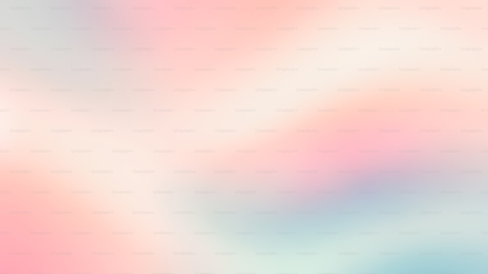 a blurry image of a pink and blue background