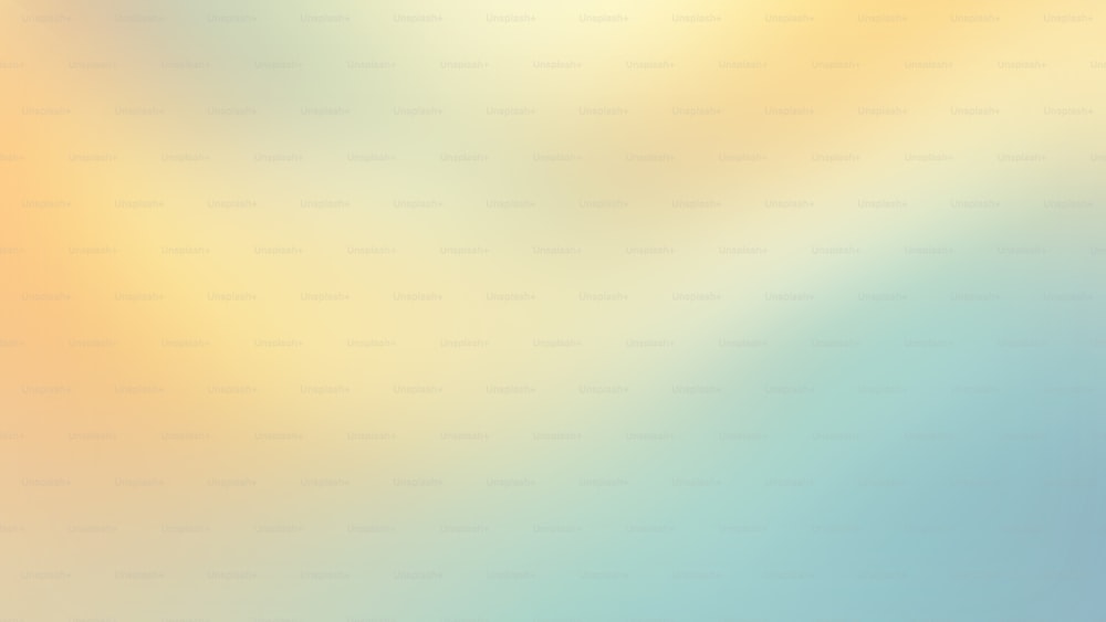 una imagen borrosa de un fondo azul y amarillo