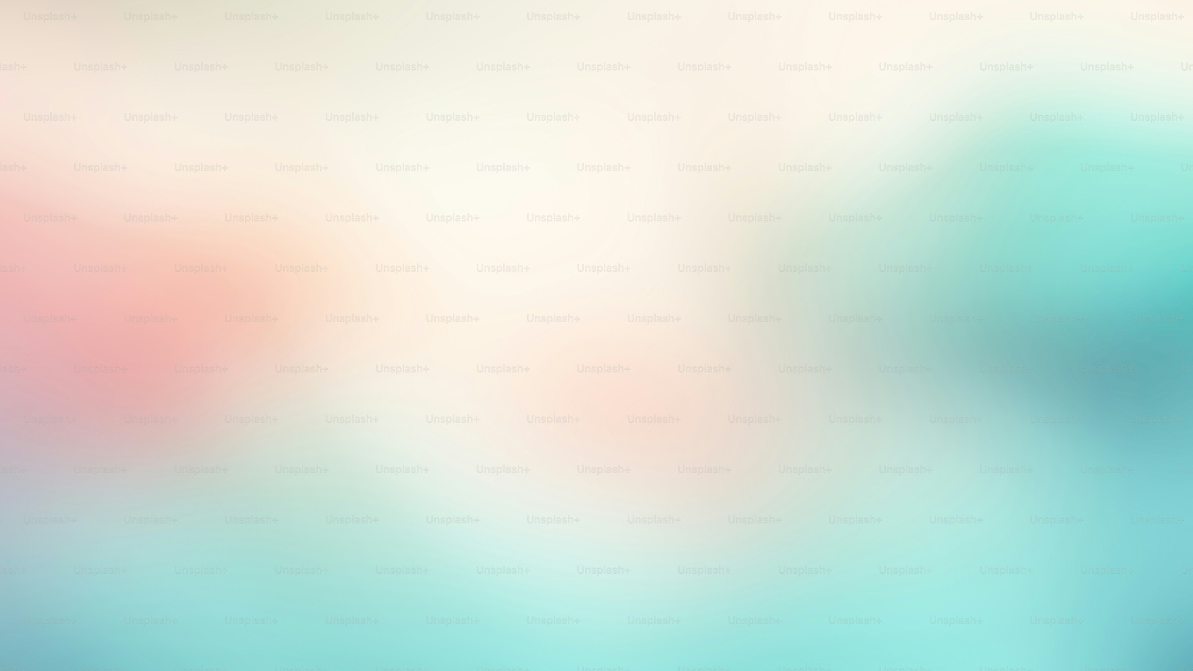 a blurry image of a blue and pink background