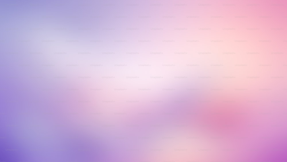 une image floue d’un arrière-plan violet et rose