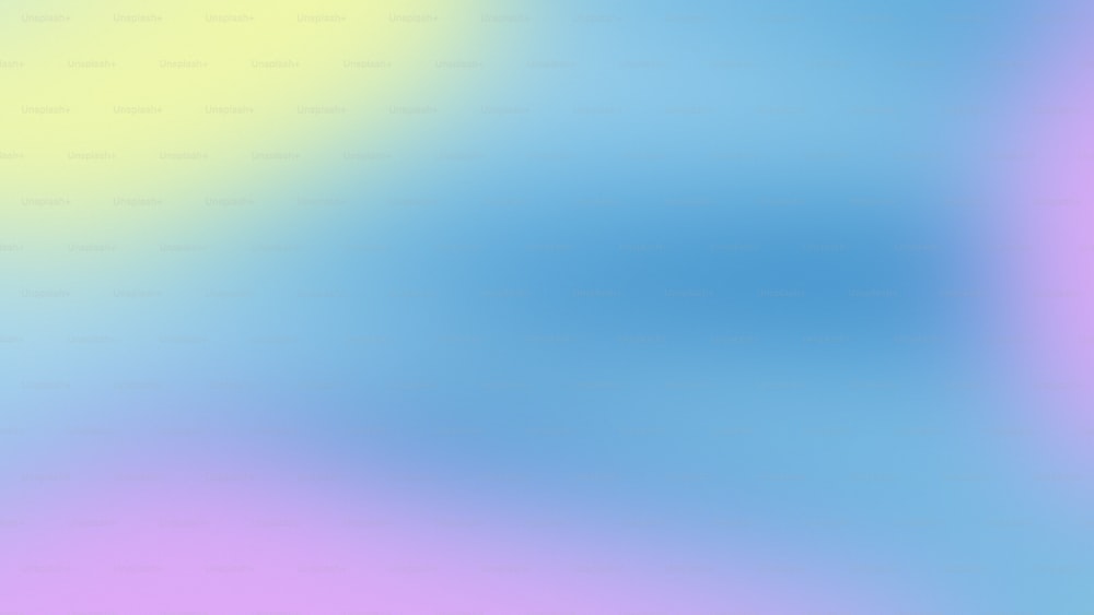 a blurry image of a blue and yellow background