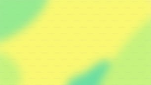 a blurry image of a yellow and green background
