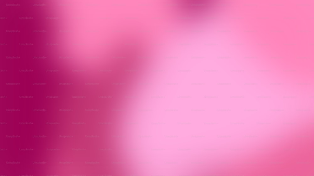 uma imagem desfocada de um fundo rosa