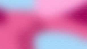 Ein verschwommenes Bild mit einem rosa und blauen Hintergrund