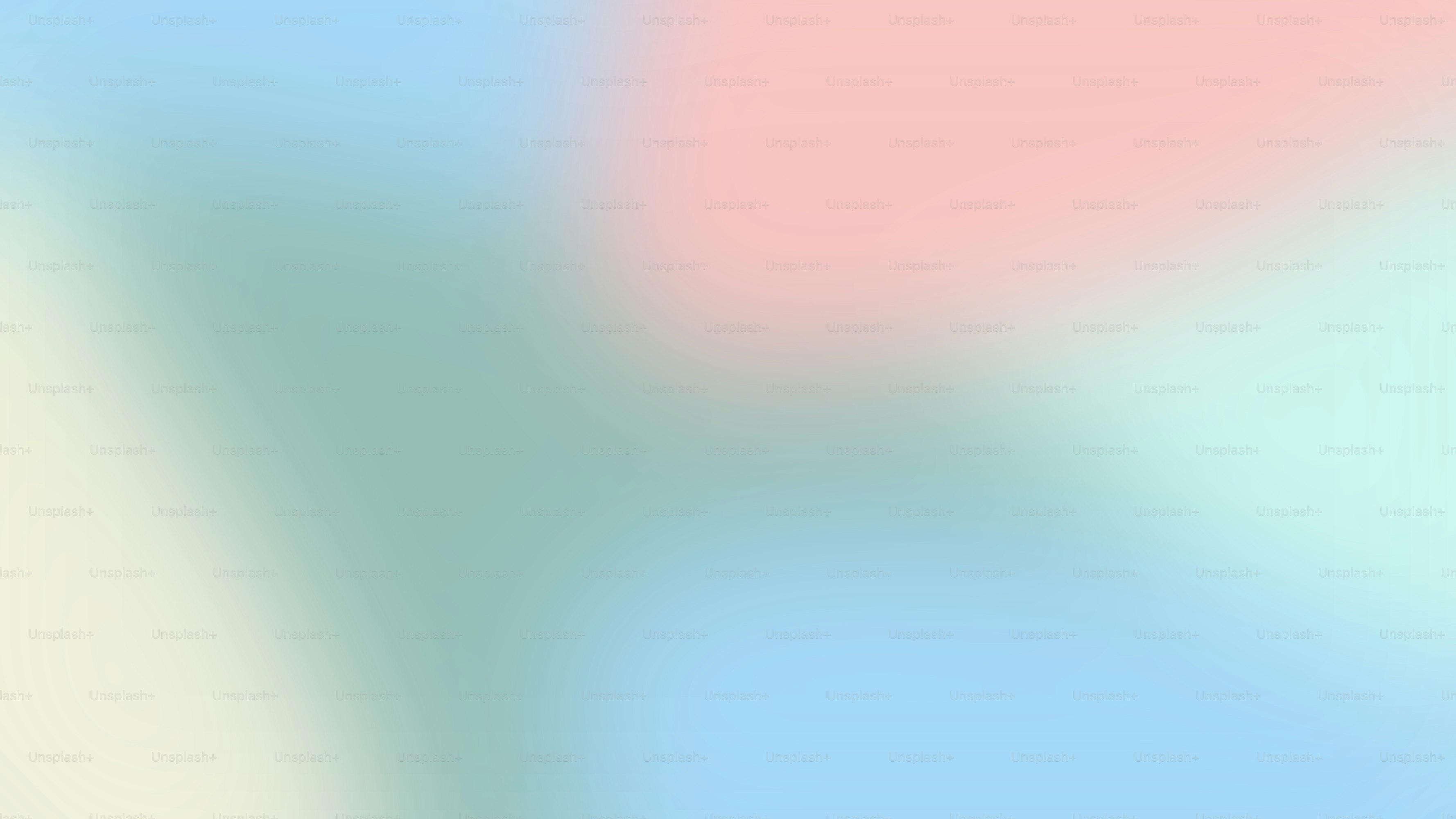 a blurry image of a blue and pink background