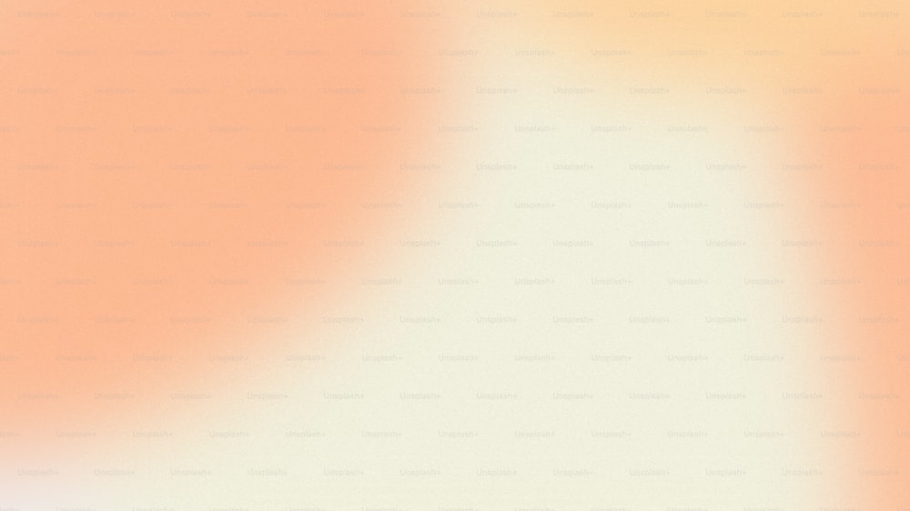 a blurry orange and white background with a black border