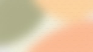 ein verschwommenes Bild mit orangefarbenem und grünem Hintergrund