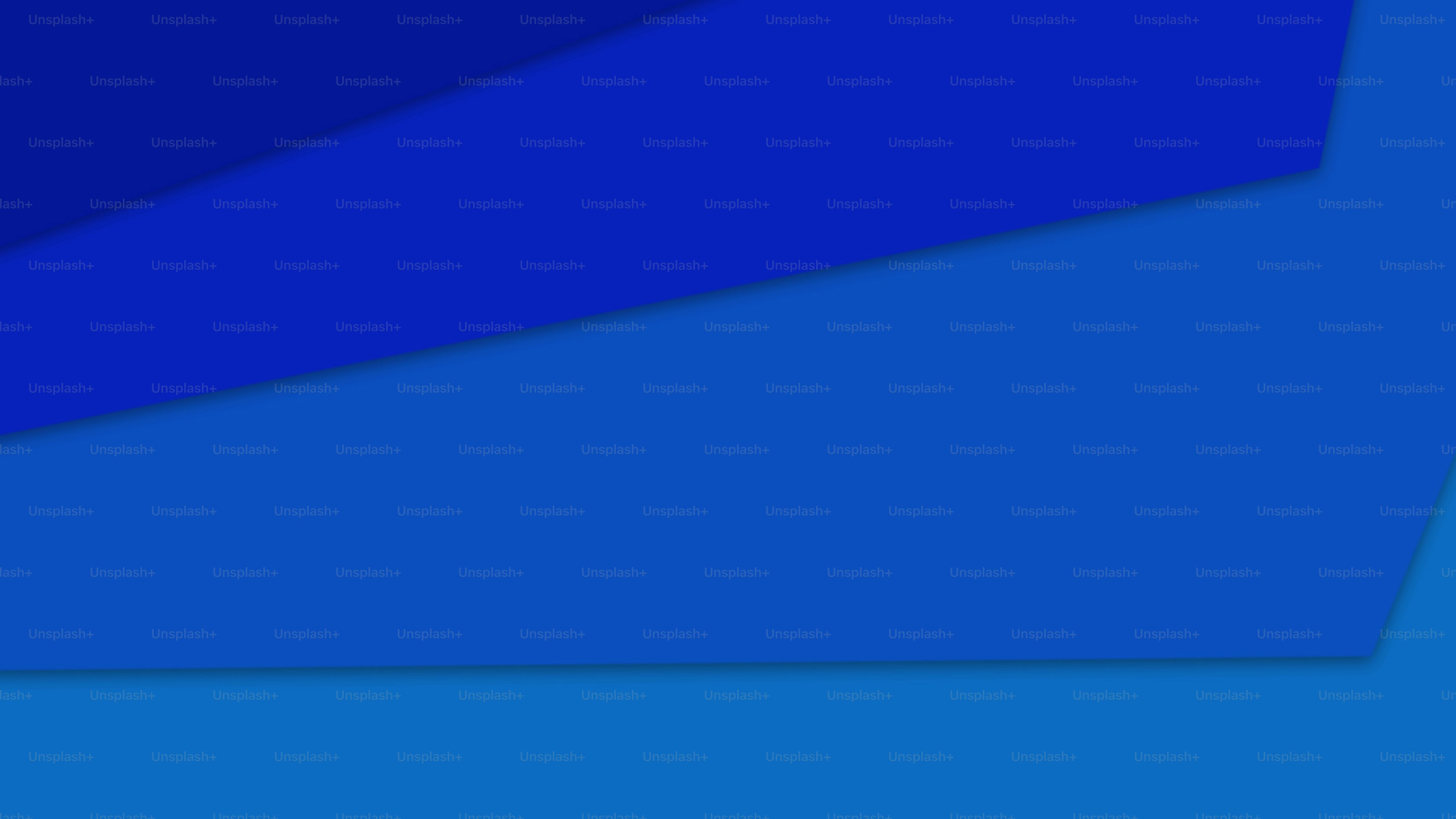 a blue abstract background with a triangular shape